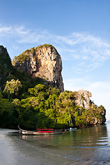 Image showing Long tail boat  at the beach in Railay Beach Thailand and rock i