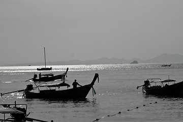 Image showing Silhouette of Long tail boat  in Railay Beach Thailand