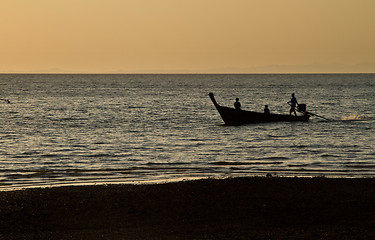 Image showing Silhouette of Long tail boat  in Railay Beach Thailand at sunset