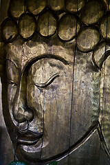 Image showing Face sculpted in wood