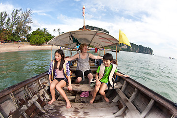Image showing Family on a Long tail boat  in Railay Beach Thailand
