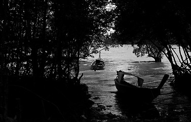 Image showing Silhouette of Long tail boat  in Railay Beach Thailand