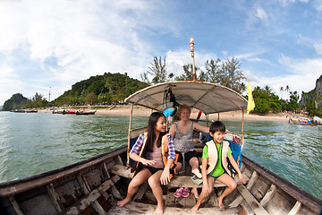 Image showing Family on a Long tail boat  in Railay Beach Thailand