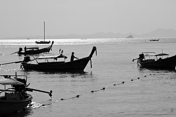 Image showing Silhouette of Long tail boat  in Railay Beach Thailand