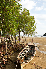 Image showing Abandonned Long tail boat  in Railay Beach Thailand