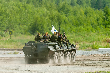 Image showing BTR-82A armoured personnel carrier with soldiers