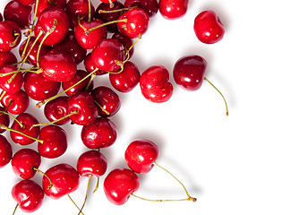 Image showing Pours pile of juicy sweet cherries