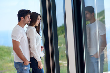 Image showing relaxed young couple at home staircase