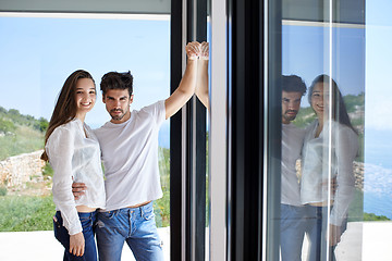 Image showing relaxed young couple at home staircase