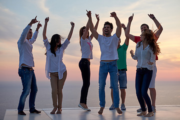 Image showing party people  on sunset