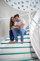 Image showing relaxed yung couple at home  stairs