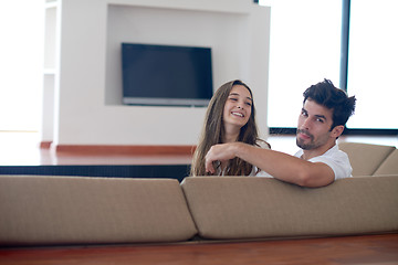 Image showing relaxed young couple at home staircase