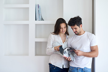 Image showing relaxed young couple at home staircase