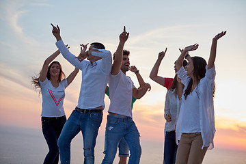 Image showing party people  on sunset