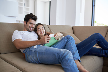 Image showing couple at modern home using tablet computer