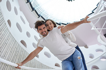 Image showing relaxed yung couple at home  stairs