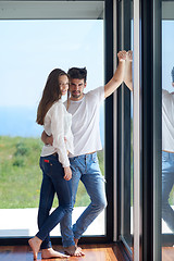 Image showing relaxed young couple at home staircase