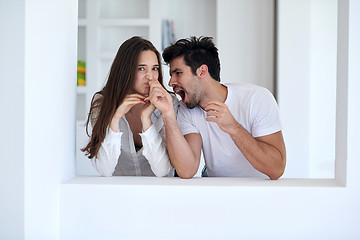 Image showing relaxed young couple at home staircase