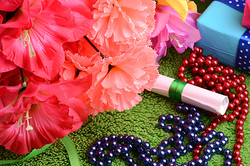 Image showing gift box set and artificial flower background