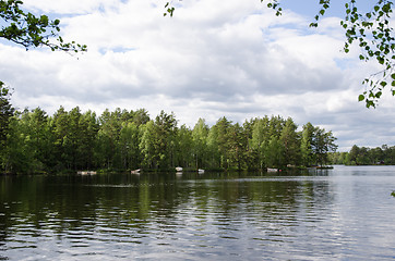 Image showing Tied up small boats in a bay