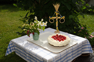 Image showing Homemade cake at a decorated table