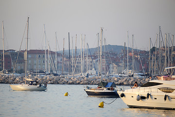 Image showing Boats anchored at sunset in Adriatic sea