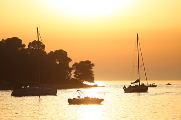 Image showing Boats anchored at sunset