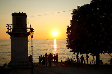 Image showing Tourists watching sunset