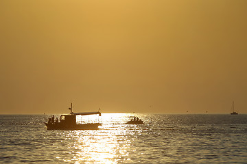 Image showing Boats at sunset