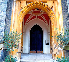 Image showing brown wooden parliament in london old  door and marble antique  