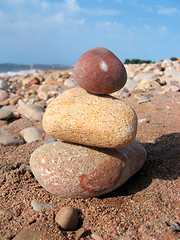 Image showing stack of pebbles on the sea shore