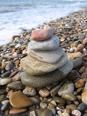 Image showing stack of pebbles on the sea shore