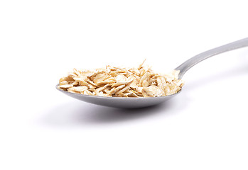 Image showing Oat flakes on spoon