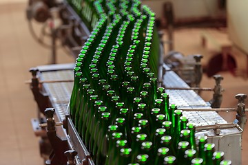 Image showing Many bottles on conveyor belt