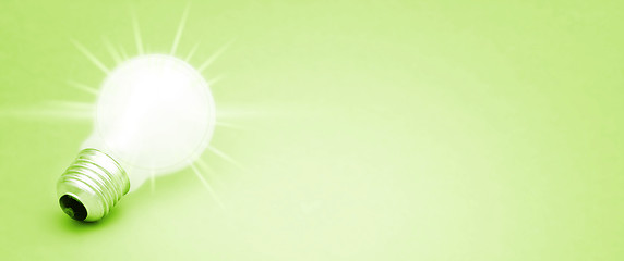 Image showing Background with lit lightbulb