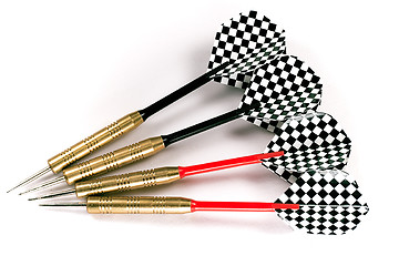 Image showing Four black and red darts