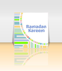 Image showing Arabic Islamic calligraphy of text Ramadan Kareem on abstract background