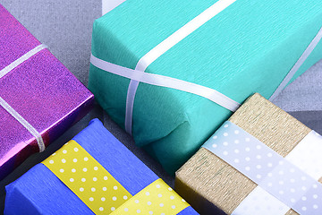 Image showing bright gifts with ribbons, holiday invitation card