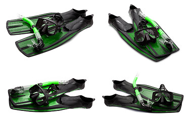 Image showing Set of green swim fins, mask and snorkel for diving on white bac