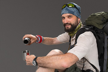 Image showing Portrait of a smiling male fully equipped tourist 