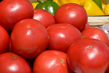Image showing red tomatoes in wooden crates