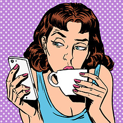 Image showing Tuesday girl looks at smartphone drinking tea or coffee