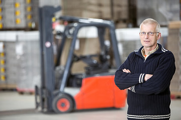 Image showing Confident Supervisor Standing At Warehouse