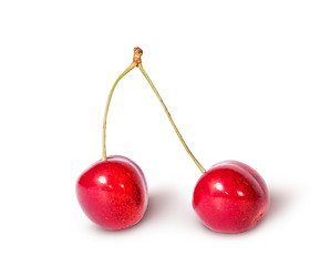 Image showing Two red juicy sweet cherries sloping