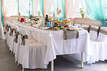 Image showing Wedding celebration table with food