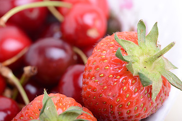 Image showing Background from fresh ripe strawberries and cherry