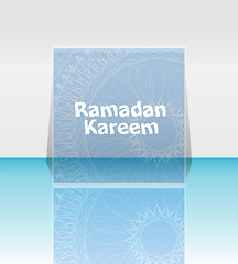 Image showing Arabic Islamic calligraphy of text Ramadan Kareem on abstract background