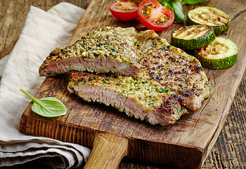 Image showing grilled meat on cutting board