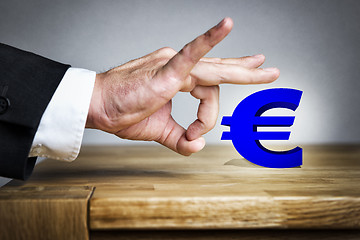 Image showing Man shoots Euro sign off