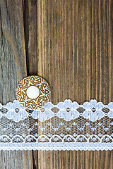 Image showing one vintage button and lace tape